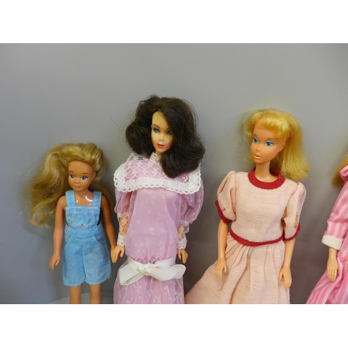 738 - Early Barbie dolls from the 1960s to 1970s with clothes, shoes, etc.