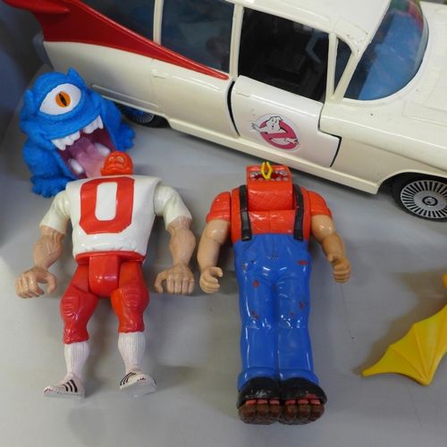 742 - Ghostbusters toys; car, helicopter, figures of monsters, etc.