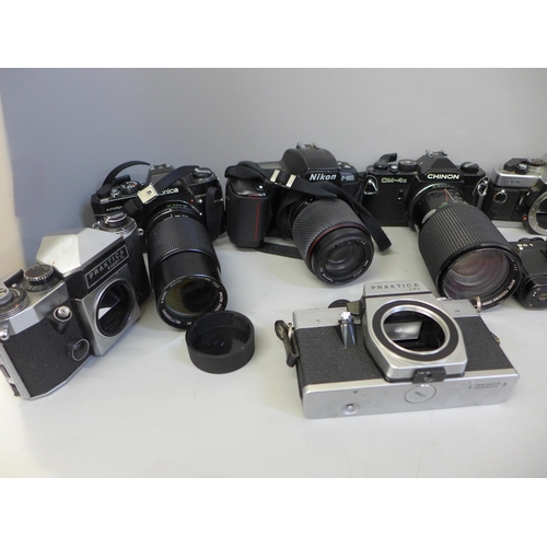 743 - A collection of nine cameras and camera bodies including Nikon 601 and Praktica