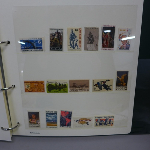 751 - Stamps; two albums of mint USA stamps