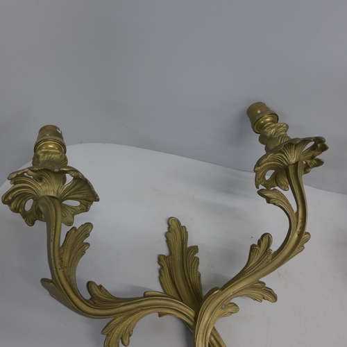 812 - A pair of metal wall sconces