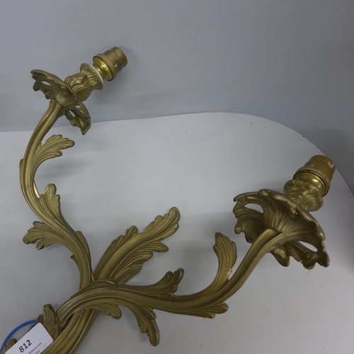 812 - A pair of metal wall sconces