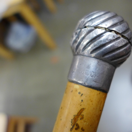 830 - A Victorian silver mounted sword stick, Birmingham 1895, a/f, and one other c1900 bamboo sword stick