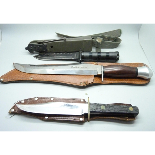 837 - Three hunting knives, one by William Rodgers and one marked Buffalo Hunter