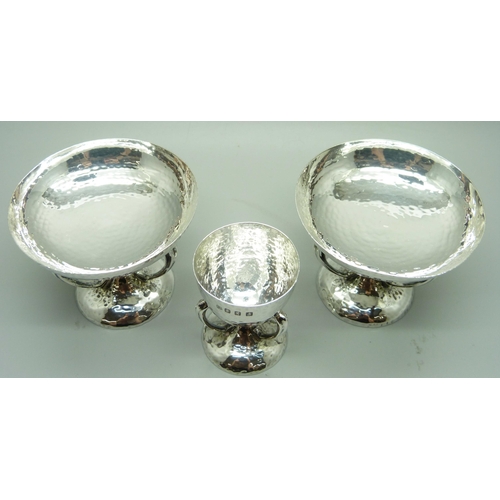 849 - A pair of hammered silver bon-bon dishes and a hammered silver egg cup, George Edward & Sons, Glasgo... 