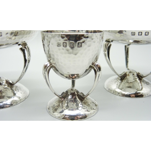 849 - A pair of hammered silver bon-bon dishes and a hammered silver egg cup, George Edward & Sons, Glasgo... 