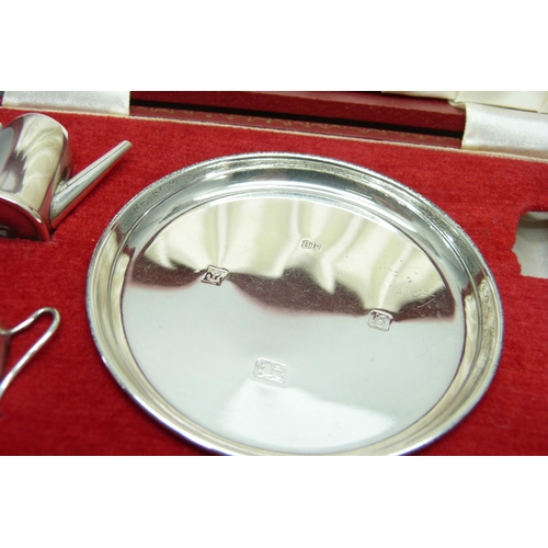 857 - A miniature silver tea service, Birmingham 1976, 70g, tray 84mm