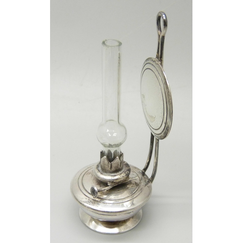 876 - Silver items comprising a small oil lamp, a small enamelled mirror, napkin ring, salt spoons, caddy ... 