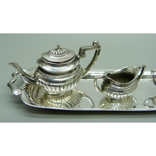 883 - A miniature silver tea service, Birmingham 1970, 68g