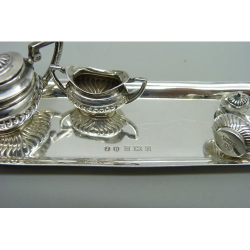 883 - A miniature silver tea service, Birmingham 1970, 68g