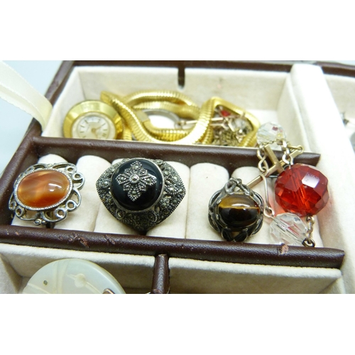 952 - Fashion jewellery, a Swarovski watch, rings including silver