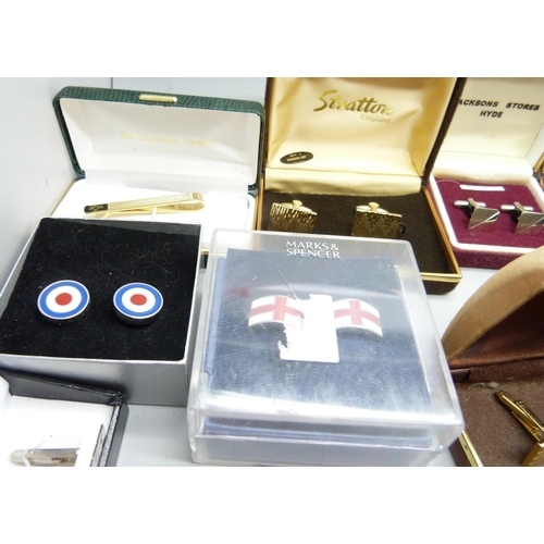 958 - A collection of boxed cufflinks and tie-pins