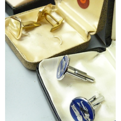 958 - A collection of boxed cufflinks and tie-pins