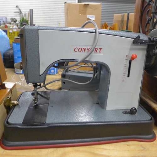 2374 - A Consort sewing machine and a Singer sewing machine - Singer sewing machine failed electrical safet... 