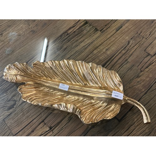 1389 - A gold metal banana leaf dish