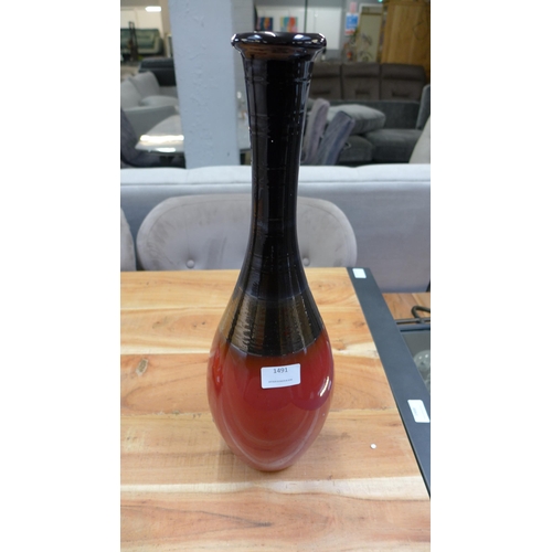 1540 - A 'lava rock' red and black vase