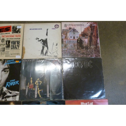 779 - Nine Rock LP records; Guns & Roses, Black Sabbath, AC/DC, The Who, etc.