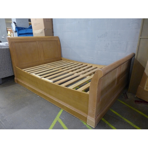 1574 - A natural oak sleigh bed frame 212 x 147 x 106cm