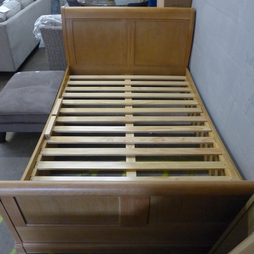 1574 - A natural oak sleigh bed frame 212 x 147 x 106cm