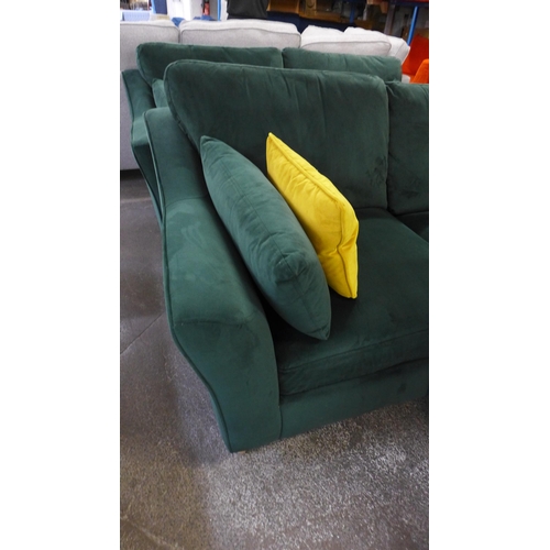 1506 - A green velvet pair of two seater sofas and armchair