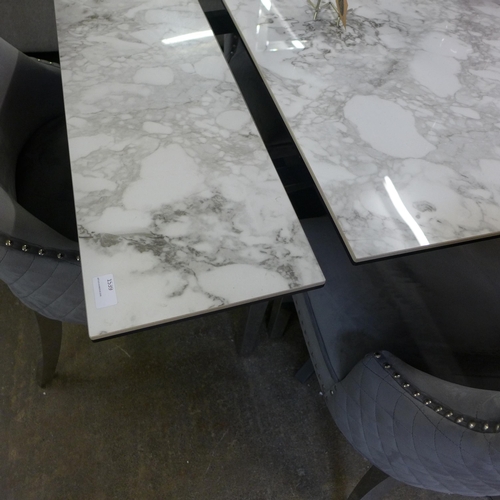 1539 - An Apollo grey marble effect extending dining table with a set of six Chelsea grey button back dinin... 