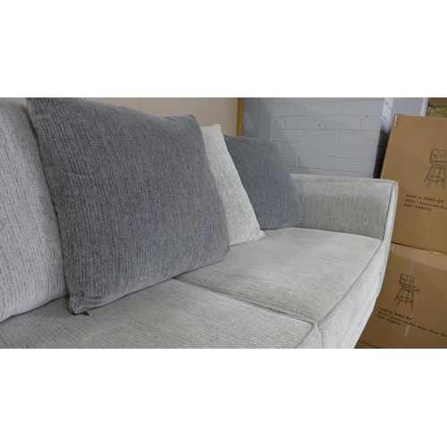 1542 - A light grey Dahlia four seater sofa and two seater