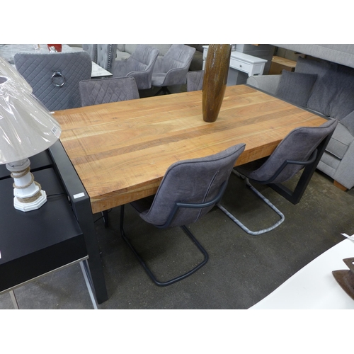 1543 - A hardwood and steel dining table and four industrial style chairs * this lot is subject to VAT