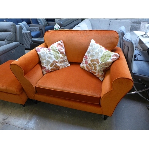 1551 - A tangerine velvet love seat with Japanese garden embroidered scatter cushions and a storage footsto... 