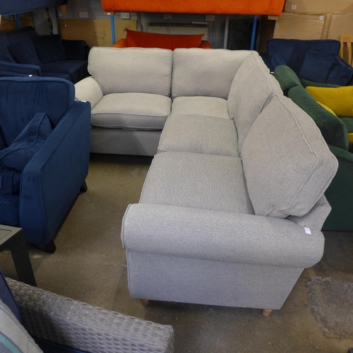 1555 - A mid grey upholstered corner sofa