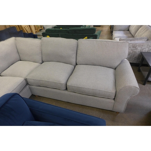 1555 - A mid grey upholstered corner sofa