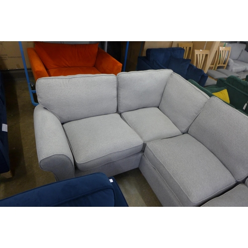 1555 - A mid grey upholstered corner sofa