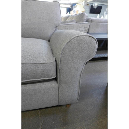 1555 - A mid grey upholstered corner sofa