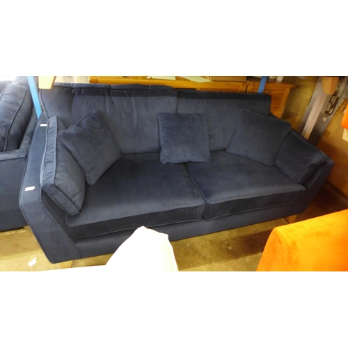 1557 - A Barker & Stonehouse navy velvet three seater sofa