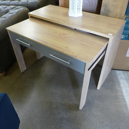 1565 - A wood effect desk/dressing table with grey drawers