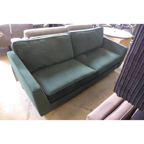 1593 - A Barker & Stonehouse green velvet four seater sofa - damaged back