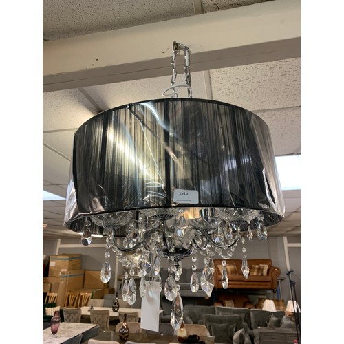 1516 - A chrome five armed chandelier with black shade