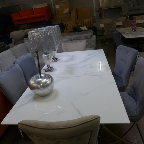 1533 - A marble extending dining table and six velvet chairs * this lot is subject to VAT