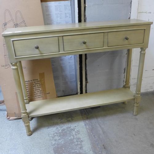 1627 - A wood effect three drawer console table