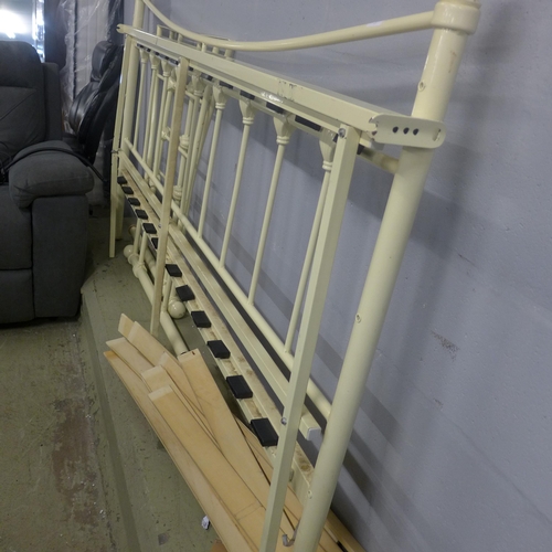 1637 - A cream painted day bed, missing bolts.