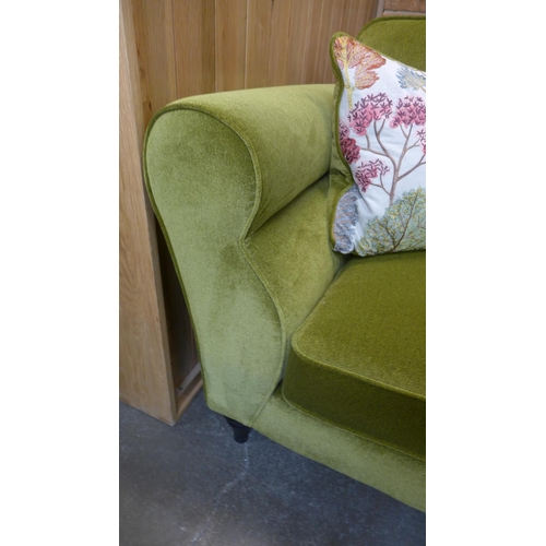 1460 - A moss green velvet love seat with Japanese garden embroidered scatter cushions