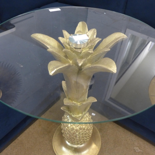 1312 - A gold pineapple occasional table with glass top