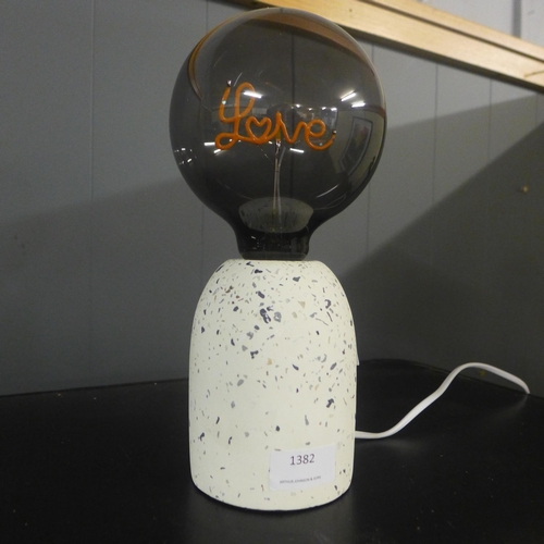 1382 - A terrazzo base table lamp with  a decorative 