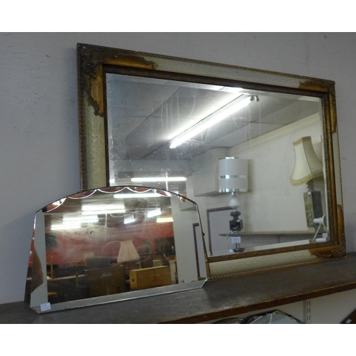 299 - A cream and parcel gilt framed mirror and one other