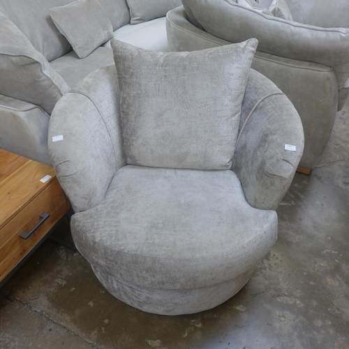 1451 - A silver velvet swivel armchair