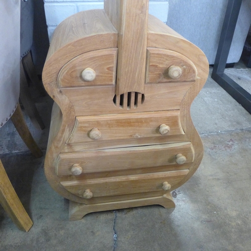 1461 - A hardwood bass guitar shaped chest of drawers