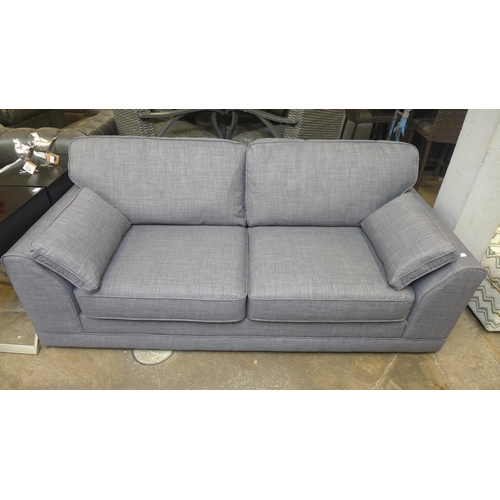 1488 - A static grey upholstered three seater sofa