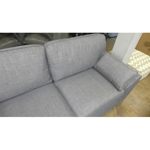 1488 - A static grey upholstered three seater sofa