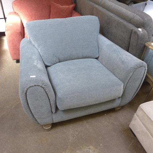 1495 - A light blue fleck velvet upholstered armchair on turned oak legs