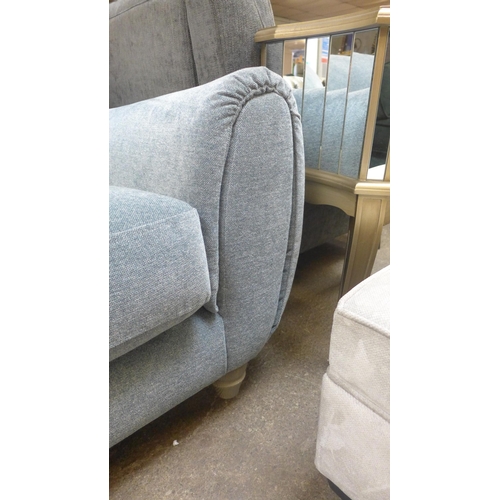 1495 - A light blue fleck velvet upholstered armchair on turned oak legs