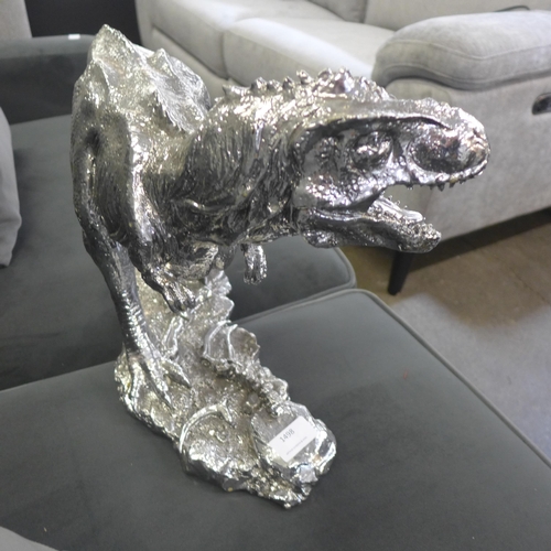 1498 - A silver T-Rex sculpture